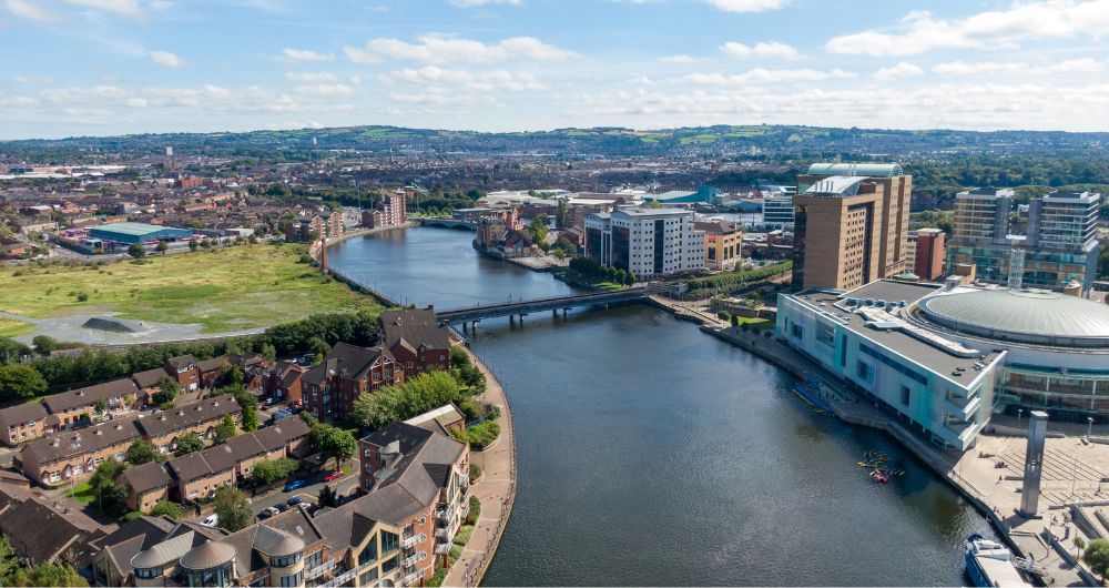 City centre of Belfast with buildings and Lagan River