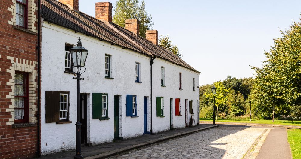 Whitewashed terrace houses built for textile workers in the 1800s in Cultra