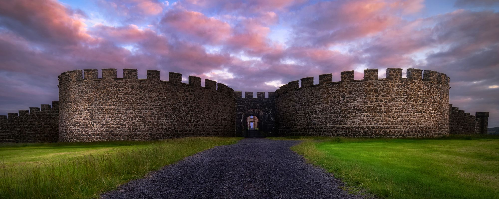 Ruins of Downhill Demesne with a dramatic sunset